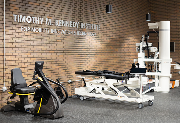 Timothy M. Kennedy Institute for Mobility Innovation & Technology inside sign with therapy equipment viewable
