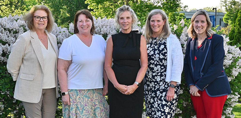 Jeanette Hughes, Heather Telford '09, Diane Lobdell '03 '14 2024 Alumna of Distinction Award Recipient, Michele Hubert-Ficus '20 and Cheryl Madge '19 at the 2024 Graduation Celebration