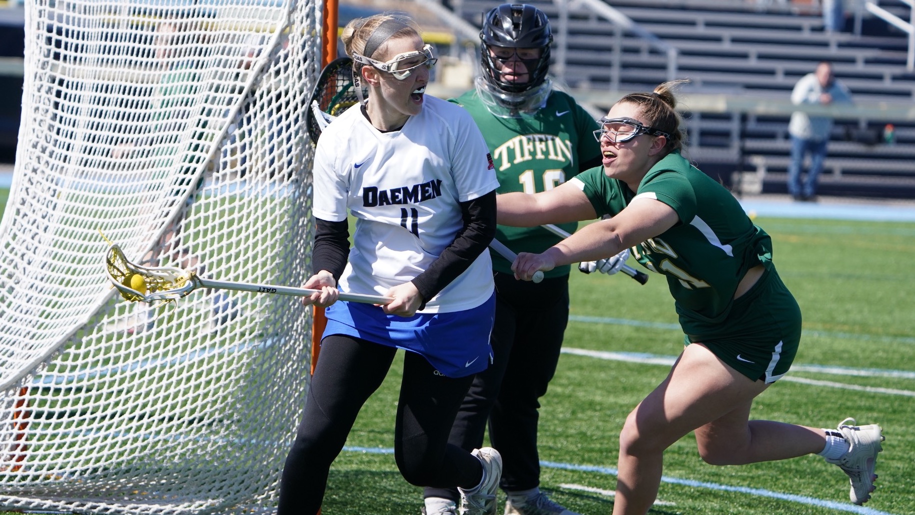 Casey Decatur playing lacrosse