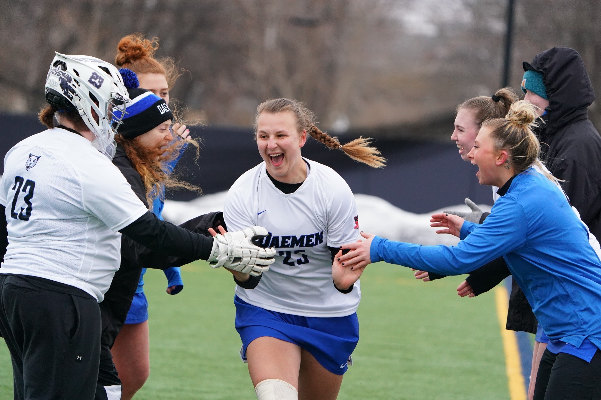 Hayley Latvala high fiving other players