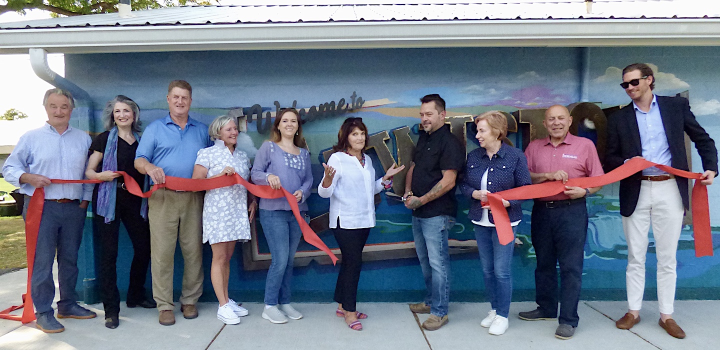 Maureen and family at ribbon cutting