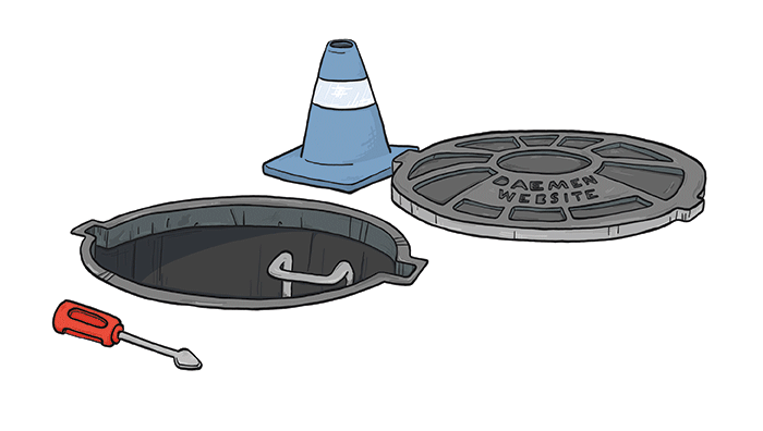 Willie the Wildcat in a manhole