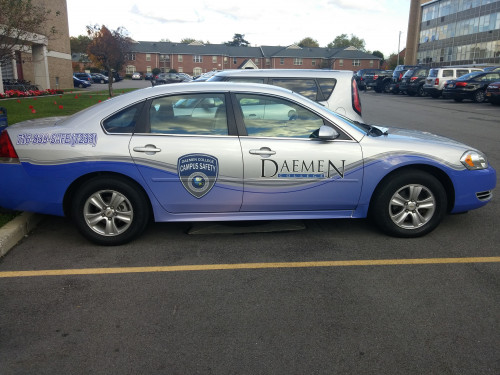 Left side of campus safety car parked in RIC lot
