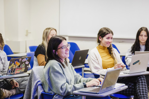Students in classroom with laptops