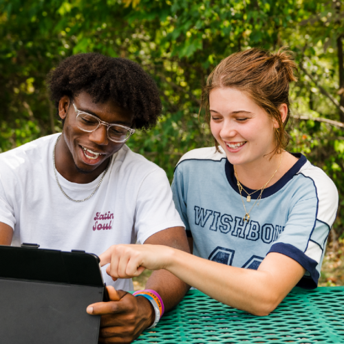 Student smiling on campus