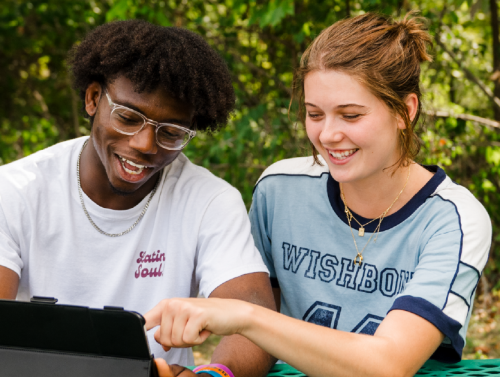 Students conversing inside the Yurtchuk Student Center.