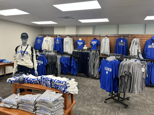 Daemen bookstore, various clothing items with Daemen on them