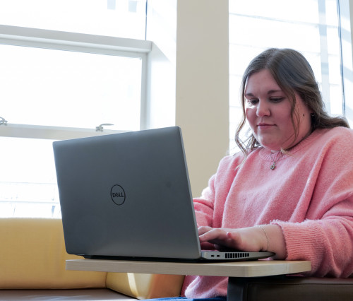 student working on computer
