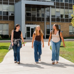 Three students walking from Duns Scotus to Student Center