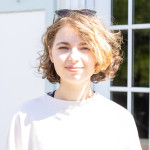 Jen wearing a white t-shirt