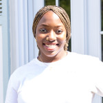 Awa wearing a white tee