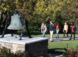 Students Walking by Bell